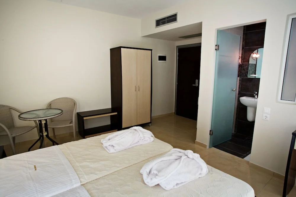 RG Status Hotel - Chambres