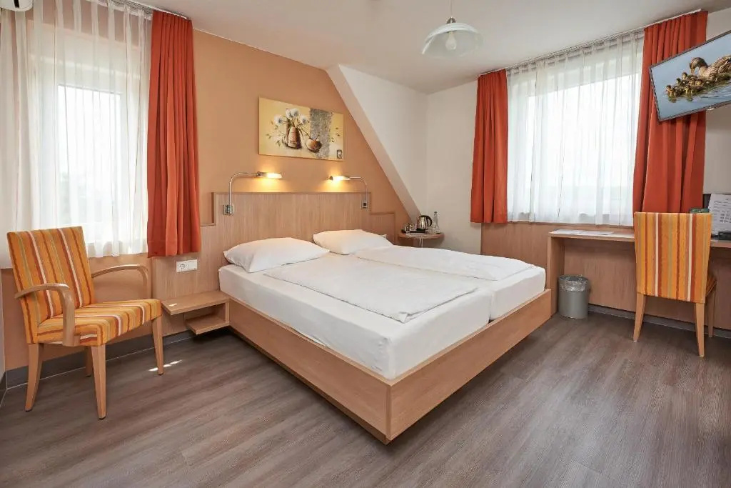 Hotel Touristik - Chambres