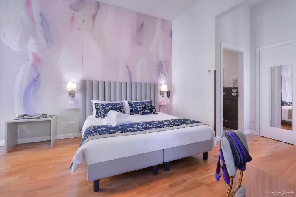 Hotel Cosmos - Chambres
