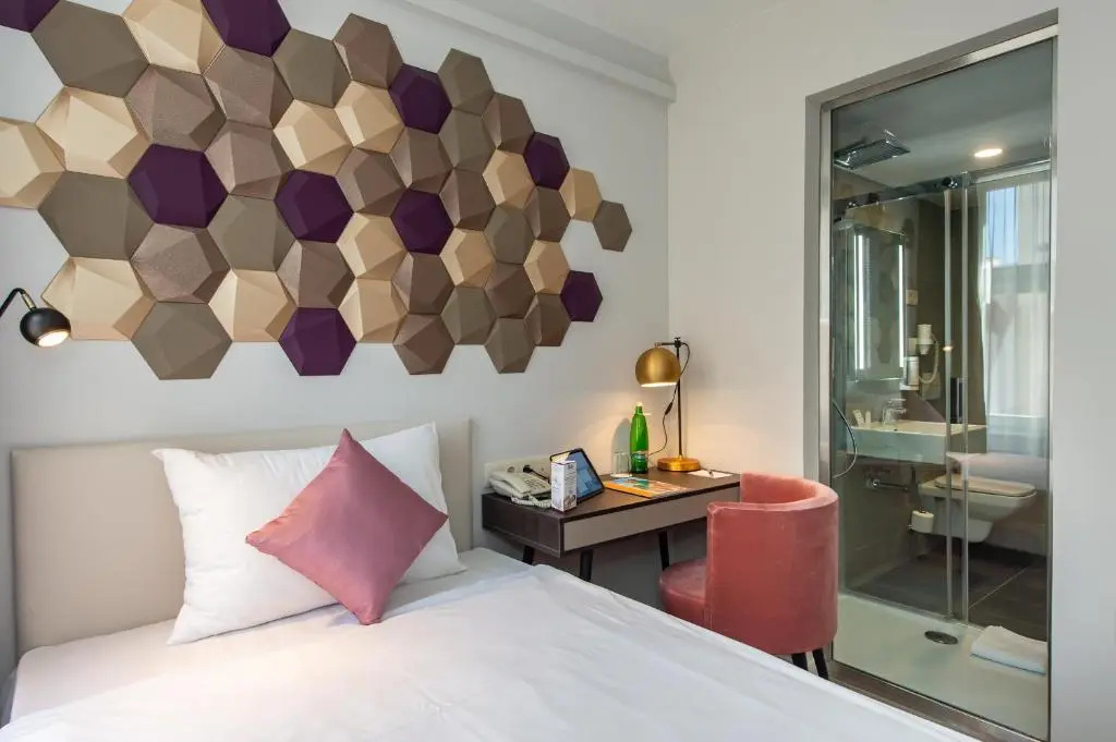 Three Corners Hotel Art - Chambres