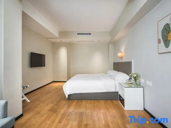 Jinyi Hotel - Chambres