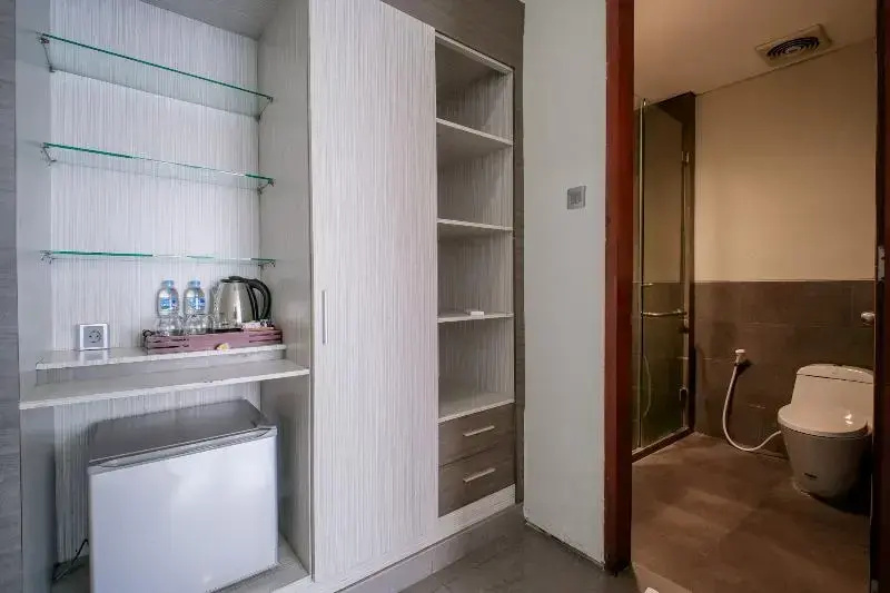 Kamini Legian Hotel - Chambres
