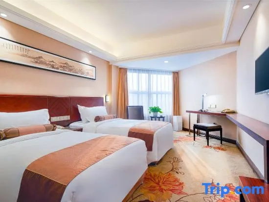 Xin Xing Hotel - Chambres