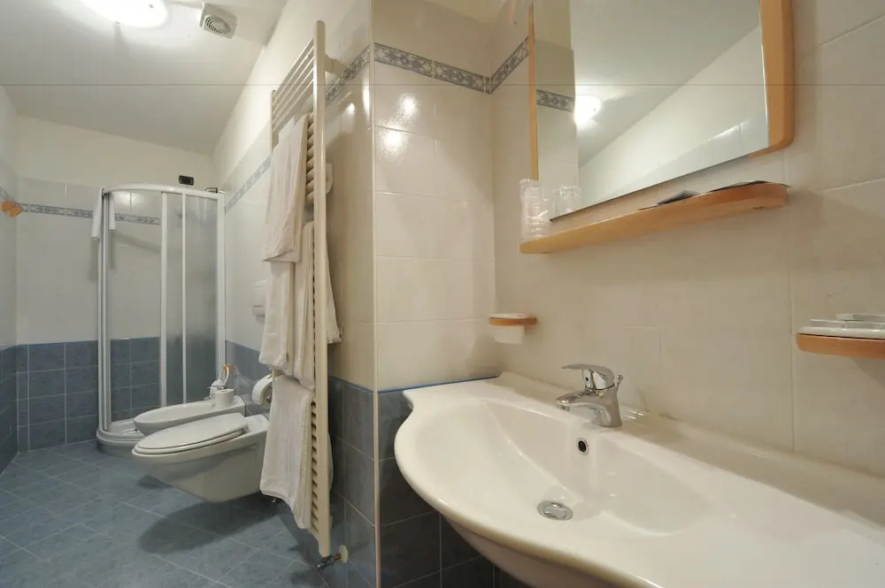 Deluxe Quadruple room with balcony