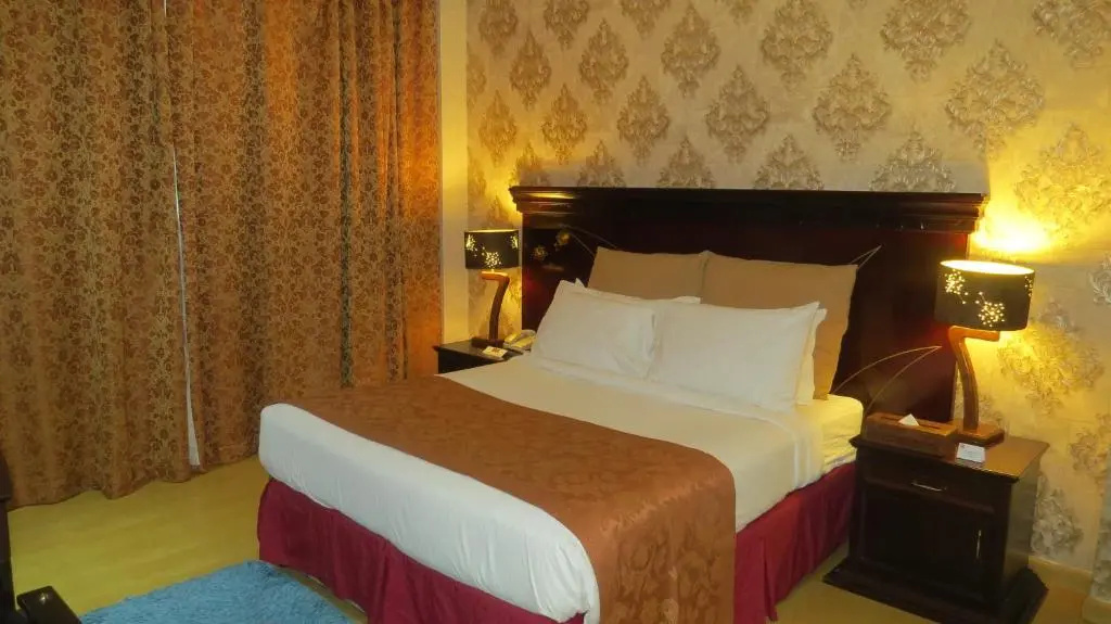 Al Jawhara Hotel Apartments - Chambres