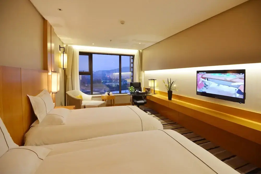 Qingdao Wushengguan Holiday Hotel - Chambres