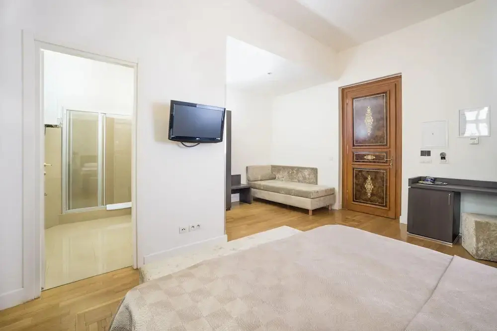 尊爵四人房，配有兩張單人床