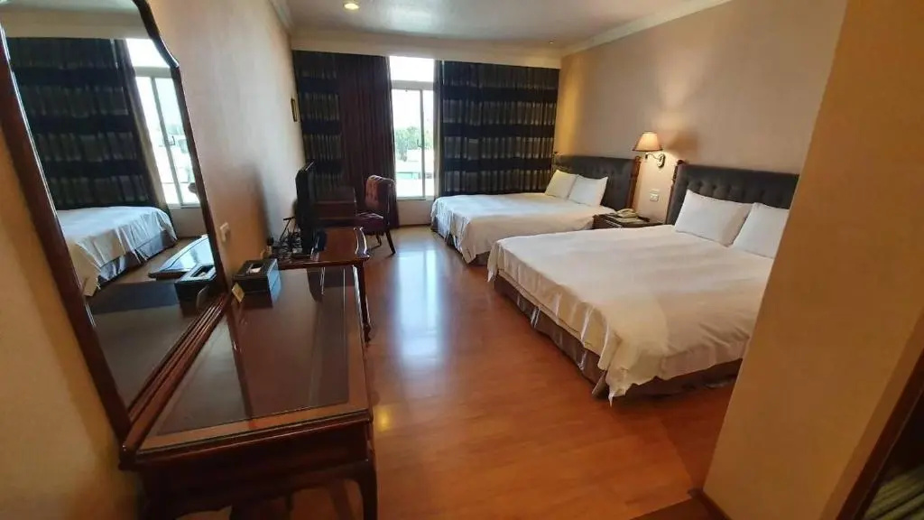 Chia Shih Pao Hotel - Chambres