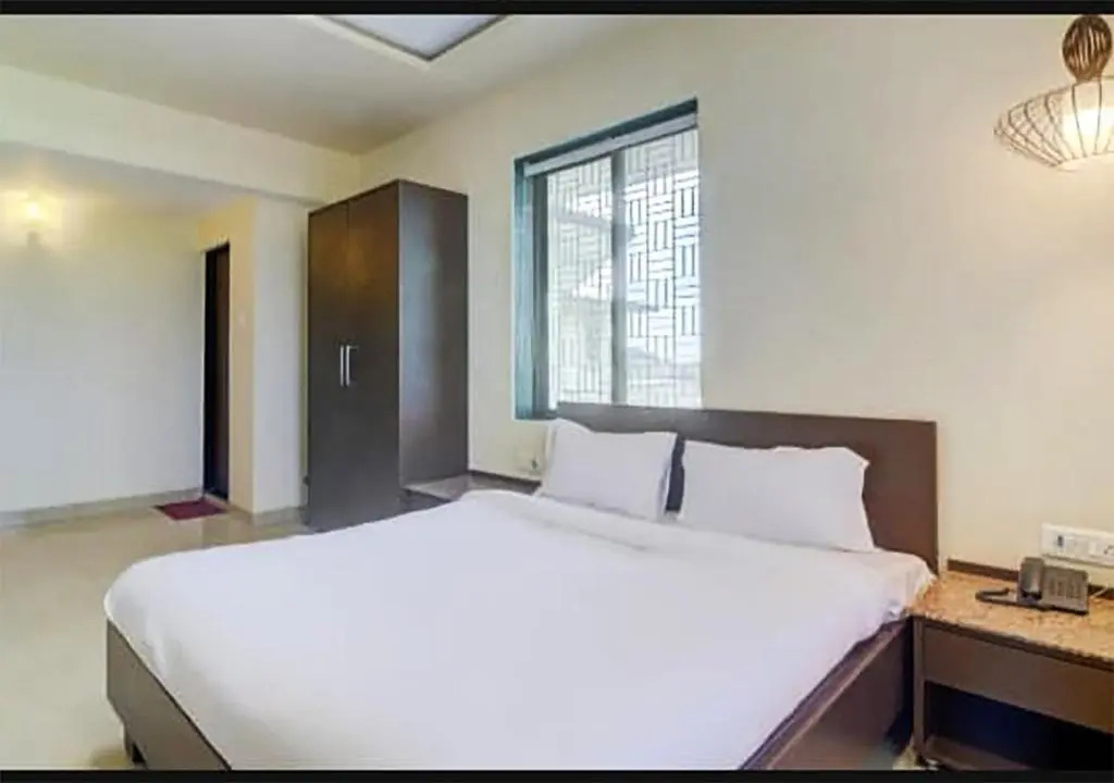 Hotel New Elite Inn - Chambres
