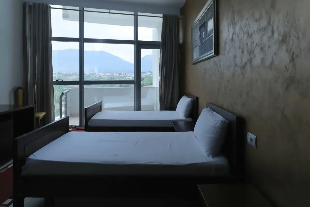 Hotel Gjuta - Chambres