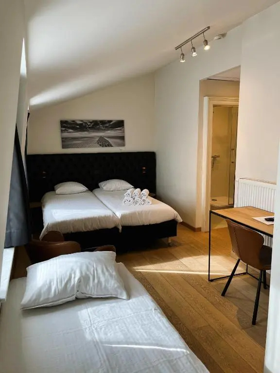 Le Parisien Hotel Bistro - Chambres