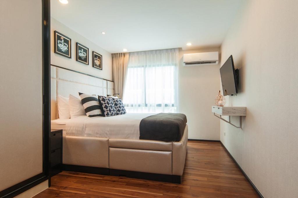 Люкс c 1 комнатой с видом на бассейн в The Title KR Beach Condotel Rawai Phuket