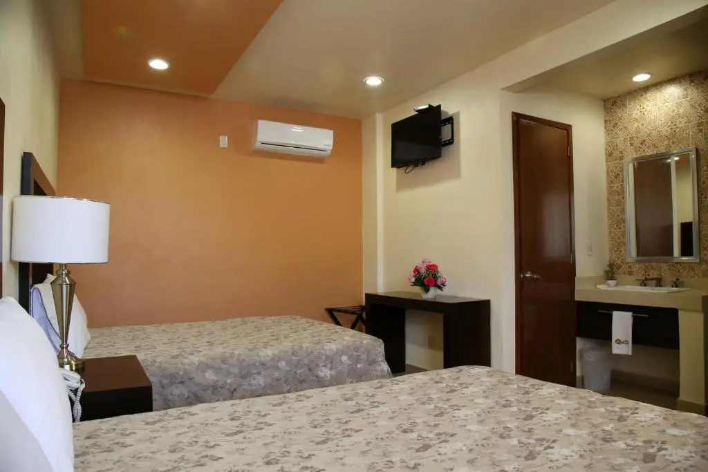 Hotel Plaza Bernal - Chambres