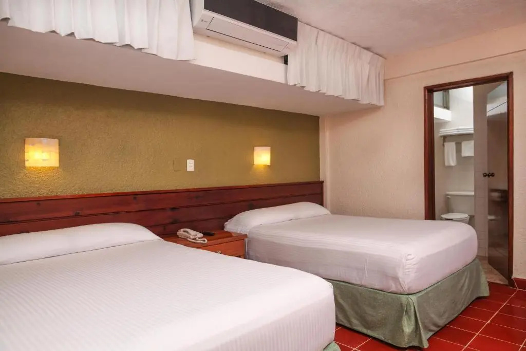 Hotel Casa Colonial Cozumel - Chambres
