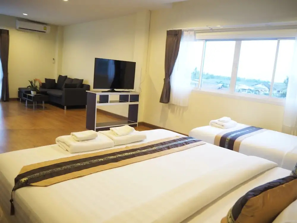 Suksomboon Hotel - Chambres
