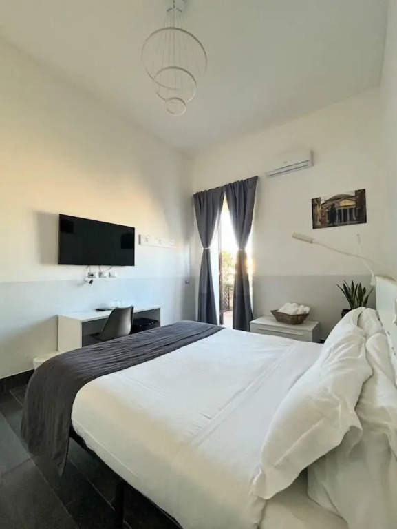 Двухместный номер Standard с балконом двуспальная кровать в Arch Rome Suites