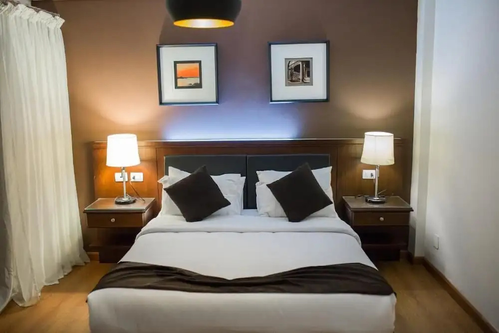 Panacea Suites Hotel - Chambres