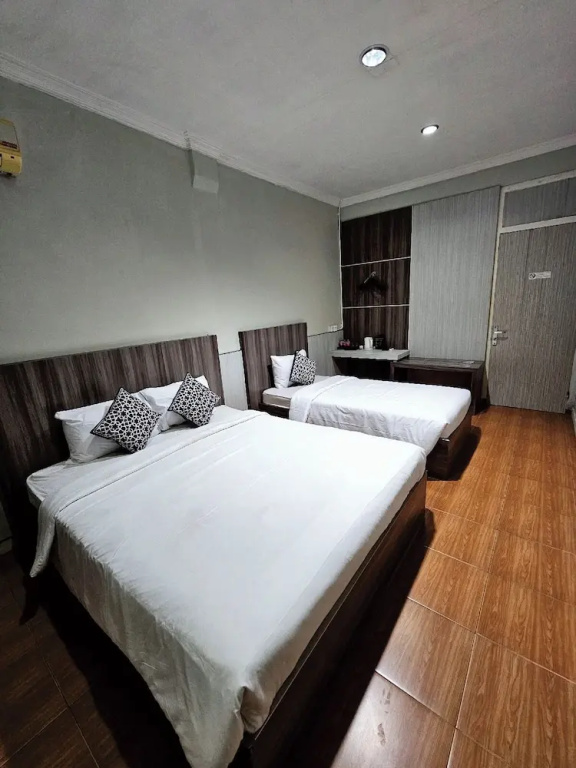 Airlangga Hotel - Chambres