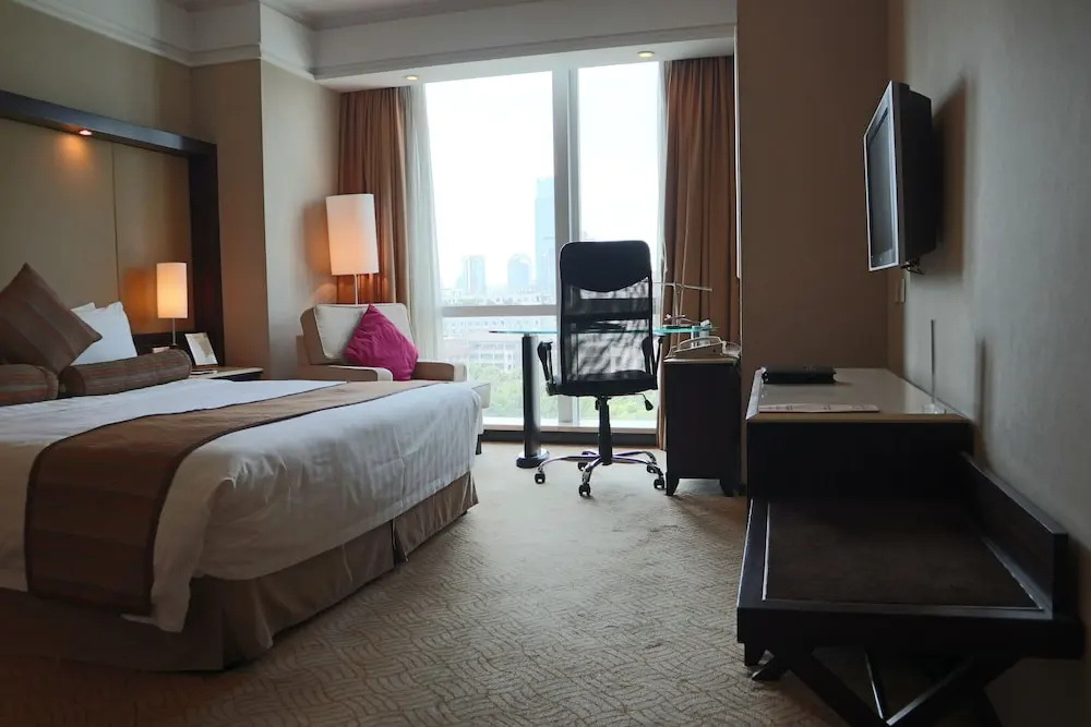 Howard Johnson Huaihai Hotel Shanghai - Chambres
