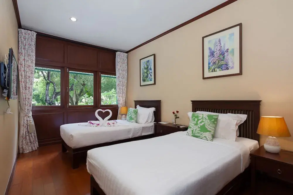 Deluxe Double room with balcony and with garden view (twin beds)