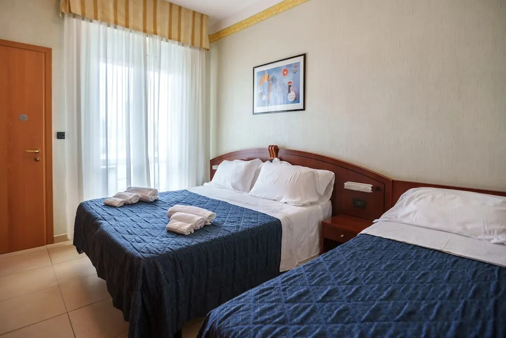 Standard Quadruple room with balcony