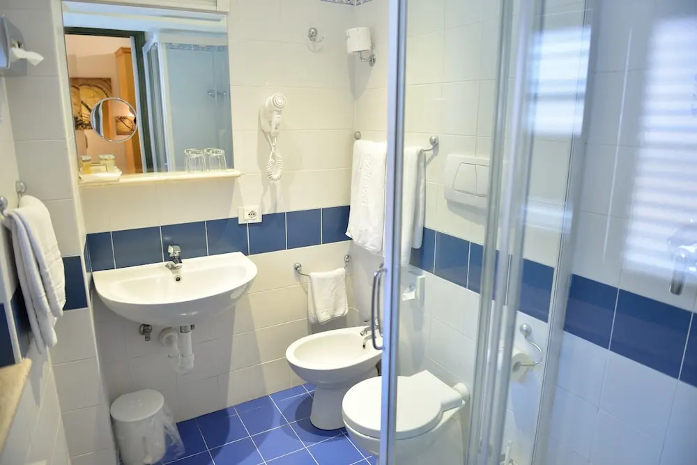 Hotel La Pensione Svizzera - Chambres