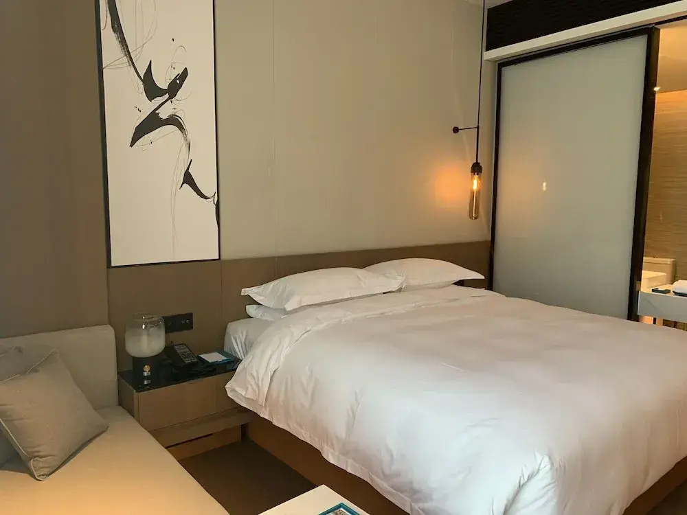 Deluxe Quadruple room with balcony and with courtyard view