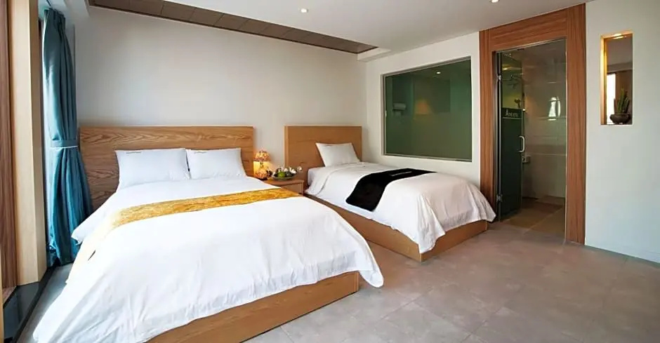 A-One Hotel - Chambres