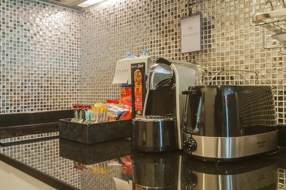 Двухместный номер Luxury с балконом двуспальная кровать в The Title KR Beach Condotel Rawai Phuket