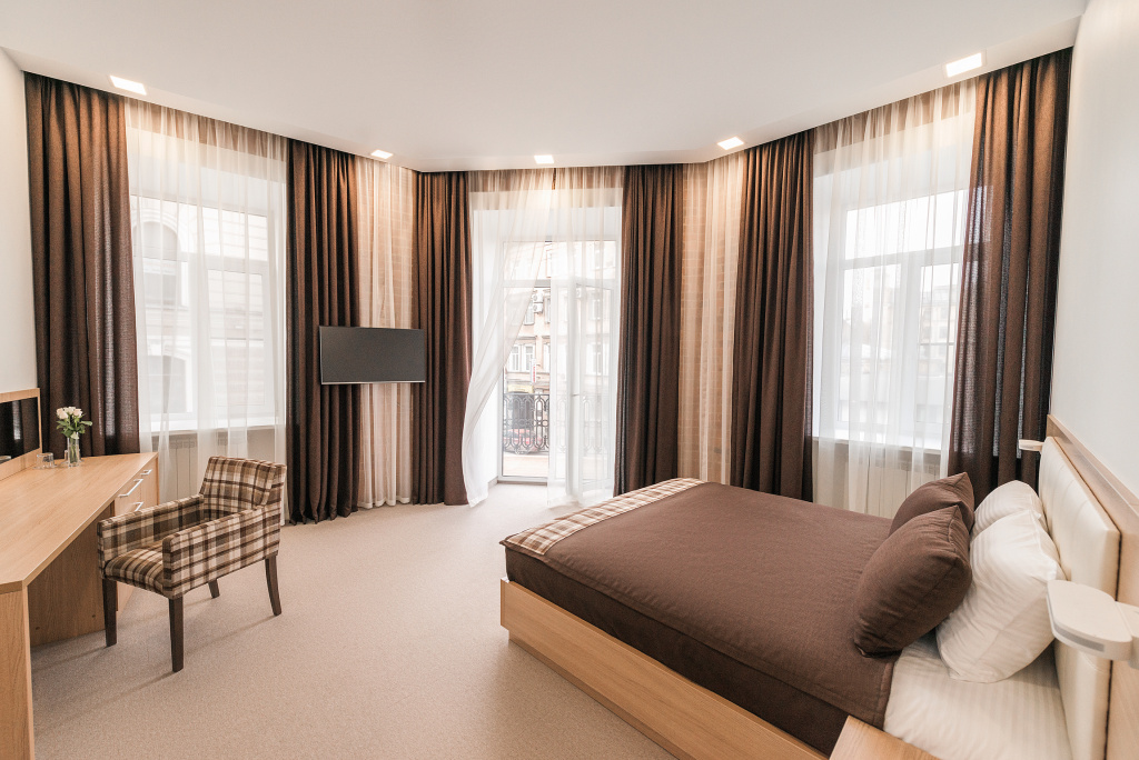 Tsentr Hotel Mini-hotel Room Type - Deluxe Double room with balcony and with city view full double bed