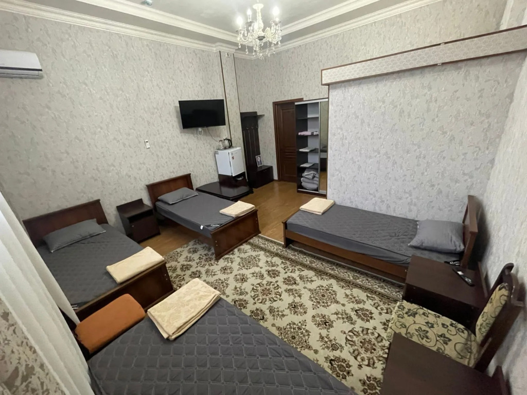 Четырёхместный номер Standard с красивым видом из окна в Ватан