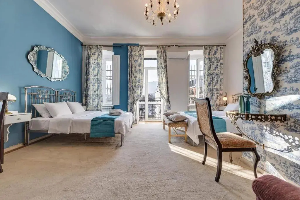 Executive Quadruple Suite with balcony and with city view