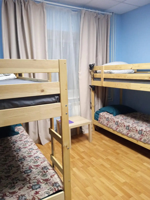 Кровать в общем номере в Zima