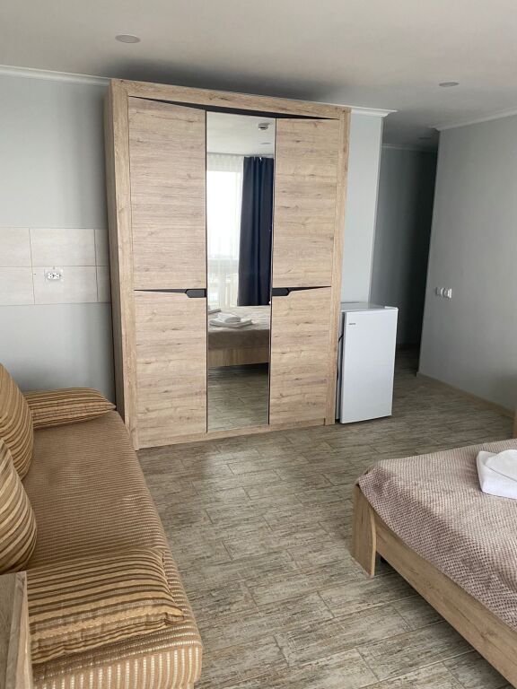 Двухместный номер Comfort с балконом и с видом на море двуспальная кровать в Вокруг света
