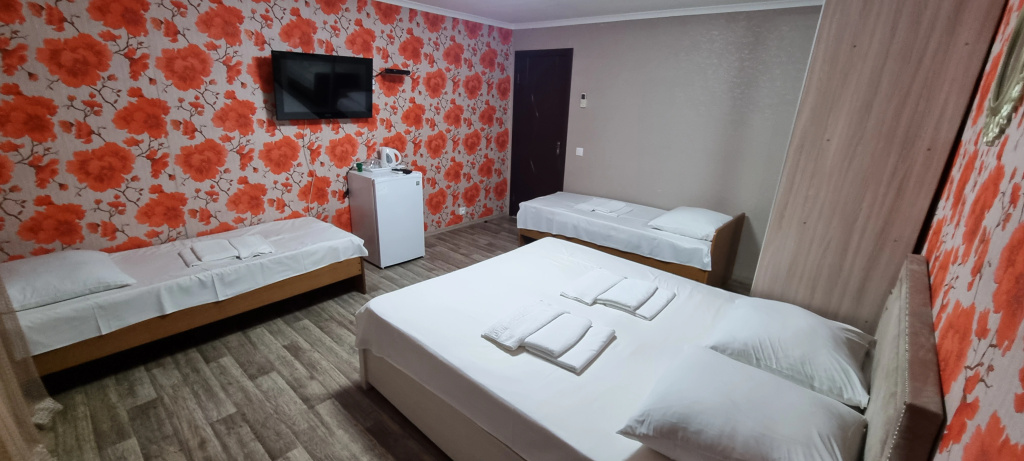 Standard Quadruple room with balcony and with sea view