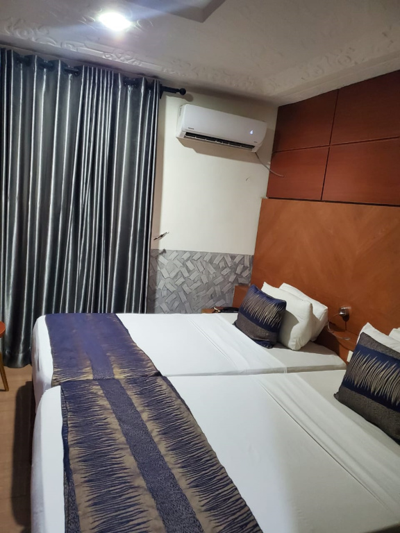 Chida International Hotel - Chambres