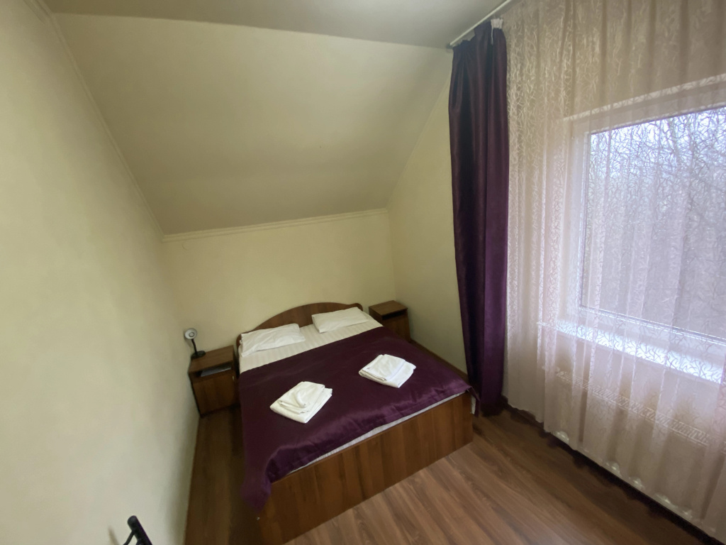 Feniks Mini-Hotel - Tap to explore photos