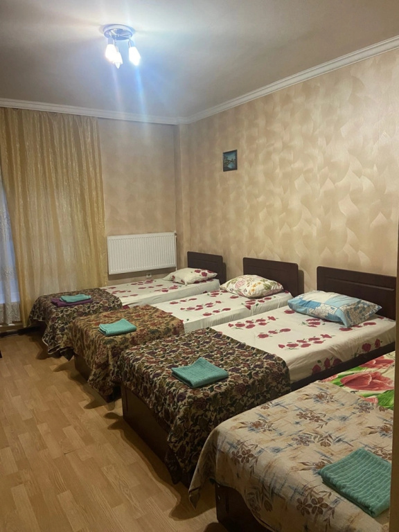 Standard Quadruple room with city view