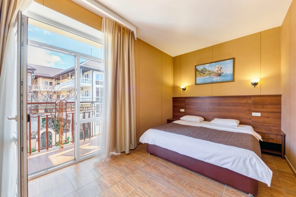 Standard Quadruple room with balcony and with view