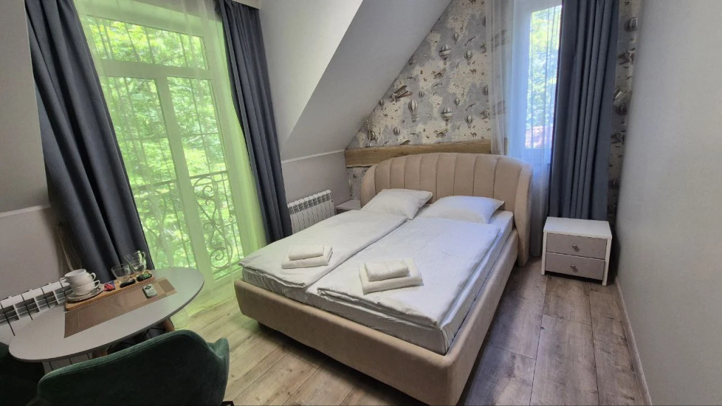 Двухместный полулюкс Мансарда двуспальная кровать в География