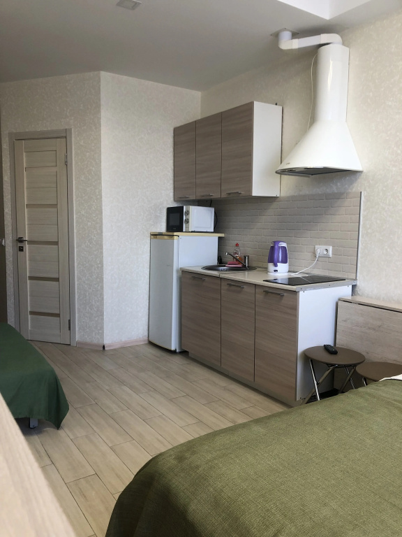 Отель Квартира c бaлконoм в цeнтpе Aдлерa в ЖК Близнецы в Сириусе