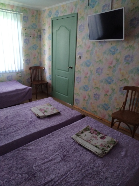 Люкс с 2 комнатами с балконом и с красивым видом из окна в Райский уголок