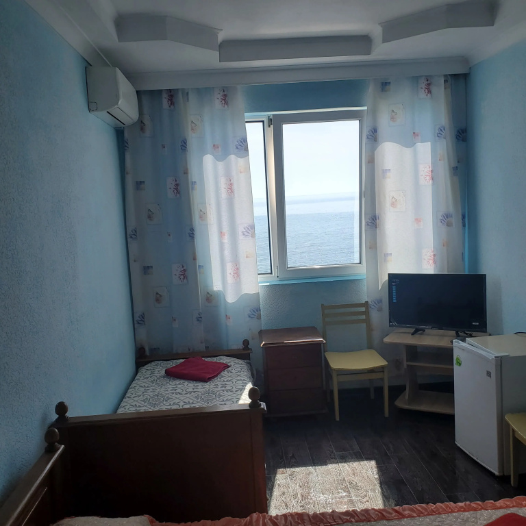 Standard Triple room with sea view