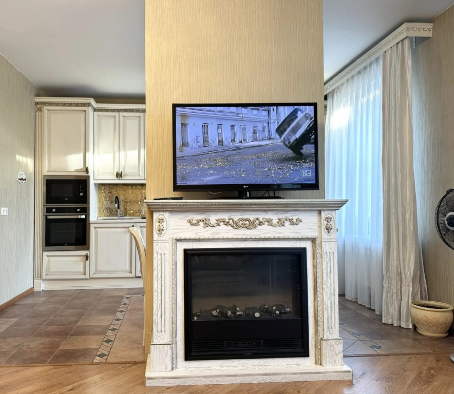Апартаменты с Камином — фото