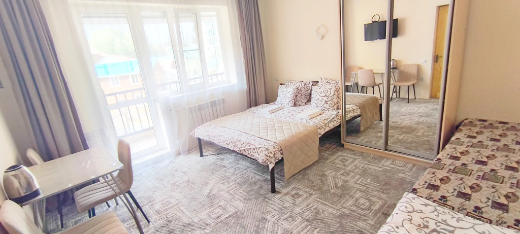 Feniks Mini-hotel Room Type - Standard Quadruple room with balcony