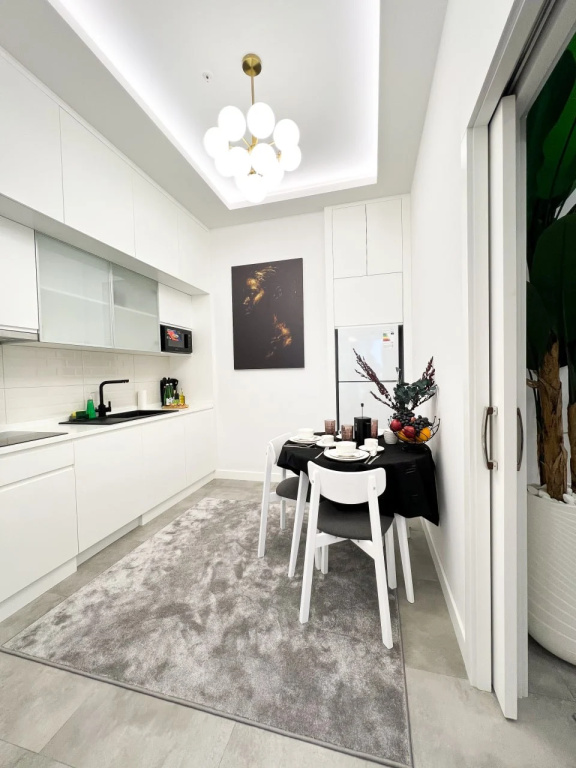 Апартаменты Уютная в центре Ташкент Nest One 25 этаж — фото