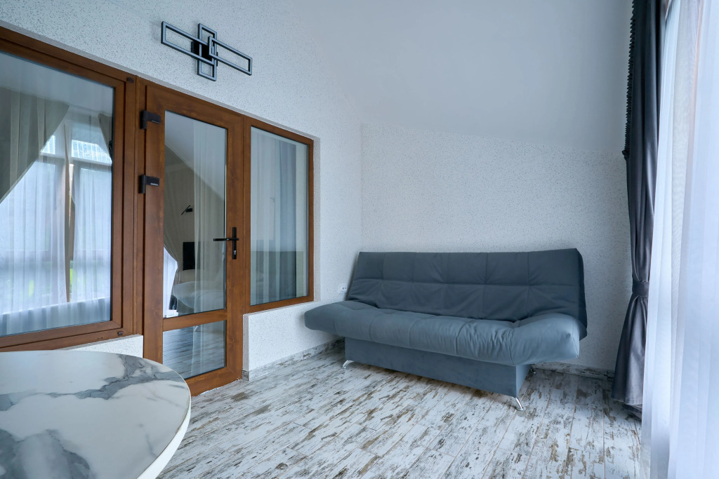 Двухместный номер Comfort с 2 комнатами с видом на реку двуспальная кровать в Белла