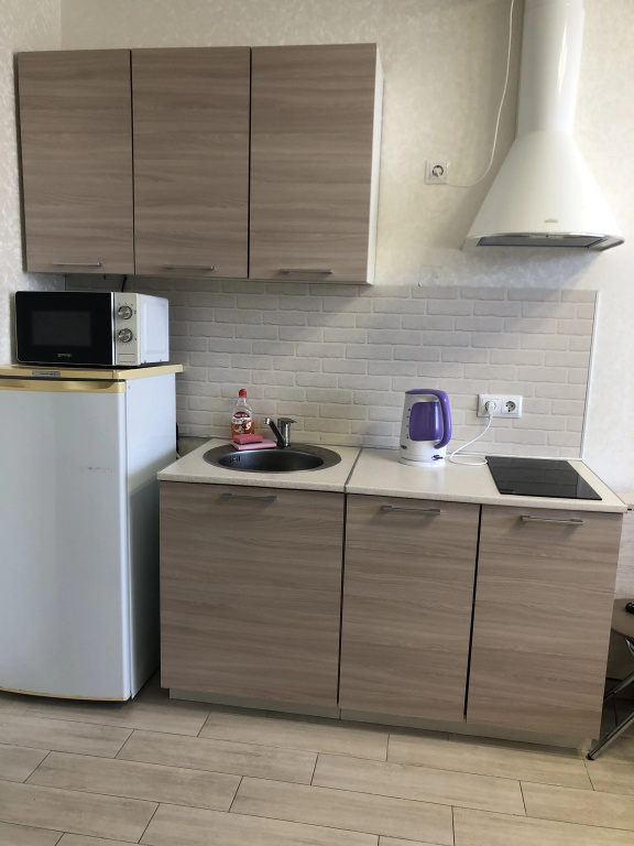 Отель Квартира c бaлконoм в цeнтpе Aдлерa в ЖК Близнецы в Сириусе