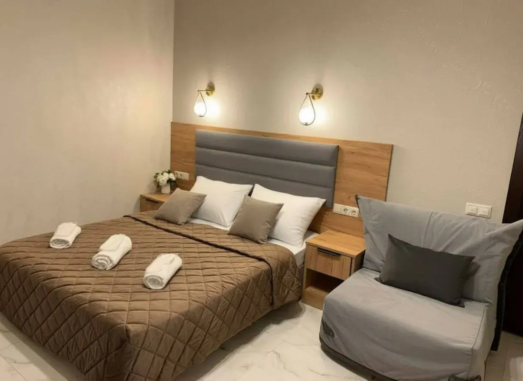 Standard Triple room with balcony and with city view