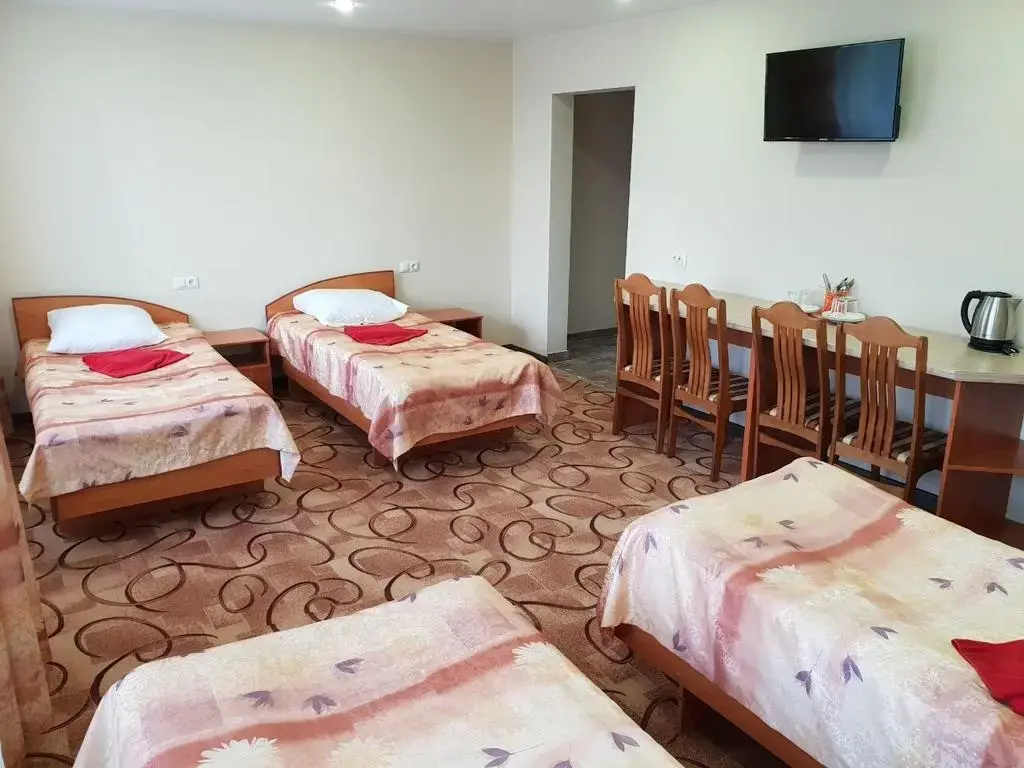 Comfort Quadruple room with balcony and with city view